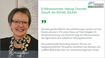 Bildbeschreibung: Dr. Monika Hackel vom BIBB steht lächelnd vor einer Wand. Neben ihr steht der Text „SI-Wertewerkstatt: Haltung, Diversität, Zukunft der SIGNAL IDUNA“. Der Text hebt die zentrale gesellschaftliche Herausforderung und den Fokus auf Nachhaltigkeit und Diversität hervor.